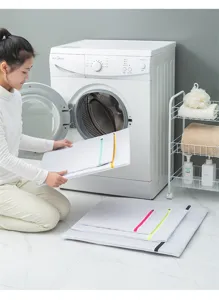 Mesh laundry bag set for delicate clothes washing, durable zipper design, home laundry storage.