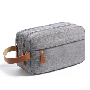 Wasserdichte graue Kulturbeutel Reise Kosmetiktasche für Herren mit braunem Ledergriff.