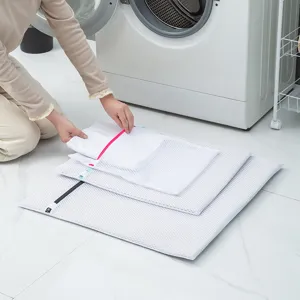 Mesh laundry bags set for delicate clothes, durable washing bags with zippers for home use.
