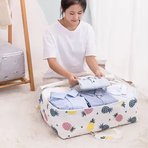 Grande borsa portaoggetti in tessuto per vestiti e coperte con simpatico motivo ad ananas