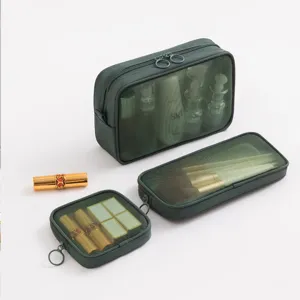 Set di 3 borse cosmetiche in rete verde scuro, organizer da viaggio per trucco e accessori.