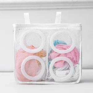 Hanging mesh shoe washing bag with dual straps and zipper for laundry drying protection use.
