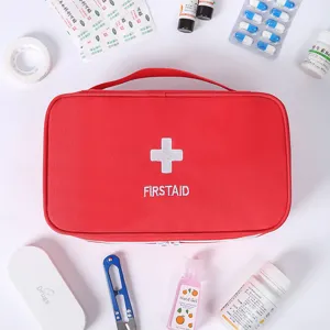Portable red first aid bag, travel medical storage organizer for home and emergency preparedness.