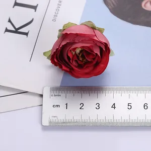 Artificial rose flower head detail shot, premium fabric floral prop for home decor and photography.