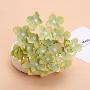 Artificial hydrangea flower heads for wedding decoration, DIY craft projects, and floral arrangements.
