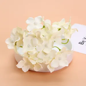 Artificial hydrangea flower heads for wedding and DIY decoration crafts, soft silk material.