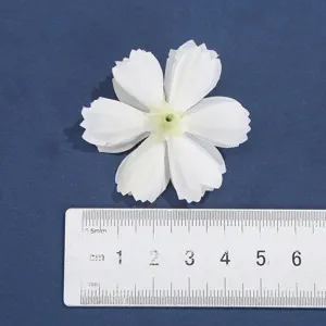 White multi-layer fabric flower detail, DIY silk flower head for wedding decoration and crafts.