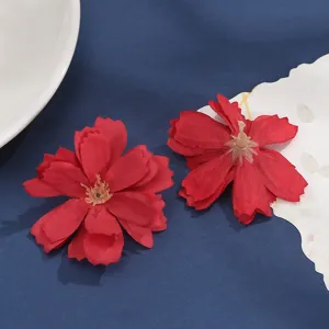 Artificial red silk flower heads for DIY crafts, wedding decorations and floral accessories.