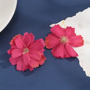 Artificial silk flower head detail shot, multi-layer petal design for DIY craft projects.
