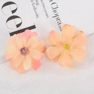 Detail shot of artificial silk flower heads, multi-layer six-petal DIY wedding decor props.