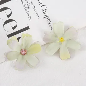 Artificial silk flower head detail, multi-layer petal DIY craft floral decoration material.