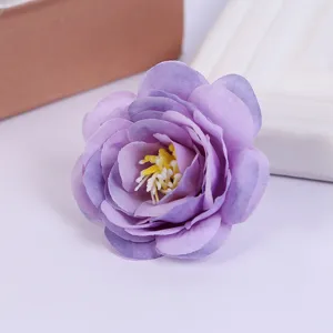 Detail shot of artificial purple rose flower head for home decor and wedding photography