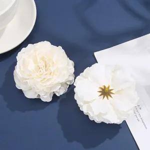 Artificial white peony fabric flowers detail shot, premium chiffon scorched edge design.