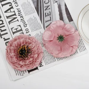 Detailed view of pink artificial silk chrysanthemum flowers for home decor and window display.