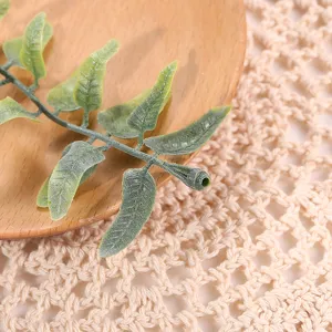 Detalle de rama de hoja de planta artificial para fotografía de boda y accesorios de decoración.