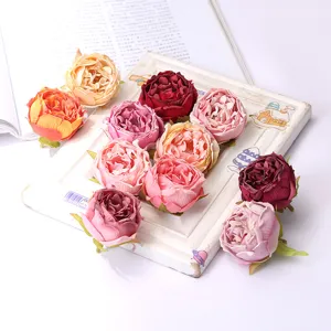 Detailed view of artificial rose flower heads, perfect for home decor and crafts.