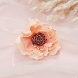 Close-up of retro artificial peony flower, pink silk camellia detail for home decor and wedding.