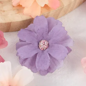 Purple artificial flower head detail, multi-layer fabric flower for DIY decor & crafts.