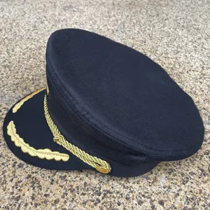 Detailed view of black cotton military flat top cap with gold embroidery brim and twisted rope.
