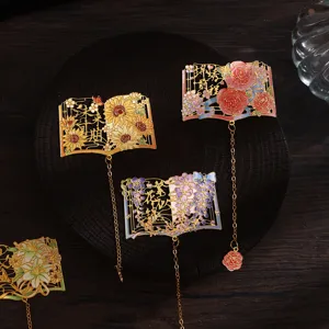 Vintage hollow metal bookmark with floral enamel design, elegant Chinese style gift.