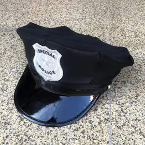 Detail shot of a black costume police hat featuring a silver embroidered special police badge.