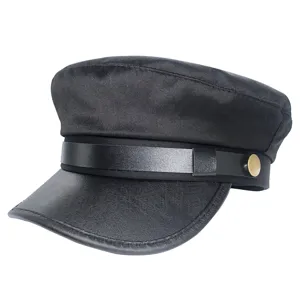 Stylish black cadet cap with leather brim and chic gold button detail for women everyday.