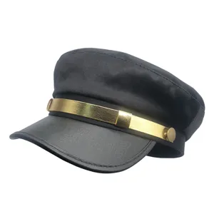 Black cadet hat detail showing gold band and leather brim, classic military style accessory.
