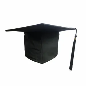 Black graduation cap detail view, classic mortarboard hat with tassel for graduation ceremony.