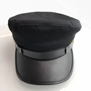 Classic black women flat top navy cap featuring leather brim and stylish gold buttons detail view