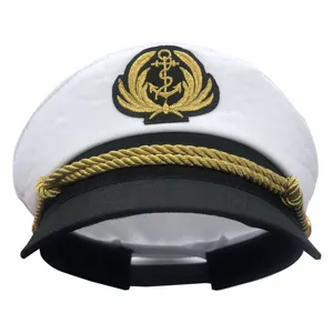Detailed view of white captain hat with golden anchor embroidery and braided rope design.