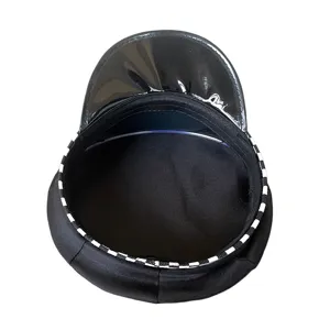 Black police hat octagonal military cap with patent leather brim and checkered band detail.