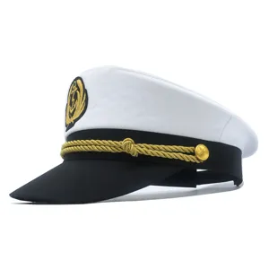 Close up of men captain hat detail featuring gold anchor emblem embroidery and braided rope band.