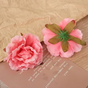 Artificial peony flower head detail, pink silk flower for DIY wedding decoration crafts.