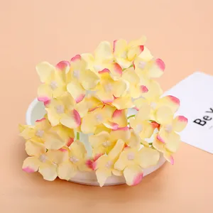 Artificial hydrangea flower heads detail view, silk material for wedding DIY craft and photography.