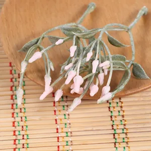 Artificial flower branch green plant decoration for home wedding hotel photography detail.