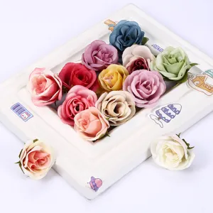 Artificial rose flower heads for wedding decoration, photography props, and home decor.