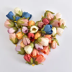 Colorful artificial tulip flower heads for DIY wedding decoration, floral arrangements, and crafts.
