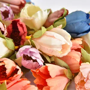 Close-up detail of colorful artificial silk tulip flower heads, perfect for DIY wedding crafts.