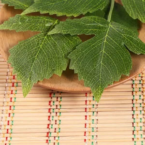 Artificial green leaves detail shot, perfect for home decor, floral arrangements and weddings.