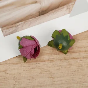 Artificial rose flower heads for DIY crafts, retro vintage faux floral buds for home decor.