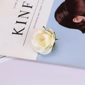Detailed close-up shot of an artificial white rose flower head, perfect photography prop.