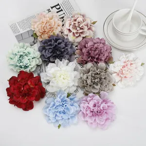 Close-up detail of colorful artificial peony flower heads for DIY floral arrangements.