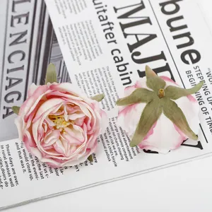 Artificial rose flower heads, pink and white burnt edge floral decor for wedding and party DIY crafts.