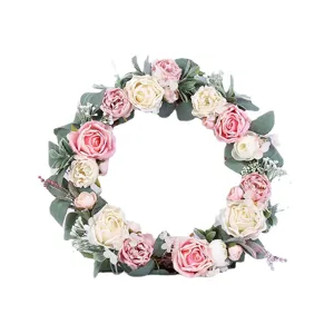 Artificial rose flower wreath for wedding decor, door hanging, and holiday party decoration.