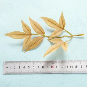 Artificial plant leaf branch for home decor, realistic design with detailed veins, table display.