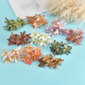 Artificial silk flower heads detail view, multi-color DIY floral accessories for craft use.