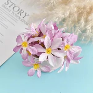 Artificial flower heads fabric fake flowers DIY accessories detailed shot for crafts.