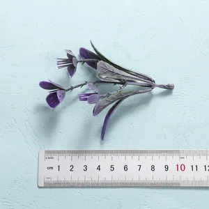 Artificial purple flower plant branch detail view, perfect for home decor and crafts.
