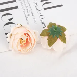 Artificial rose flower head fabric DIY decorative floral accessory for wedding and crafts.