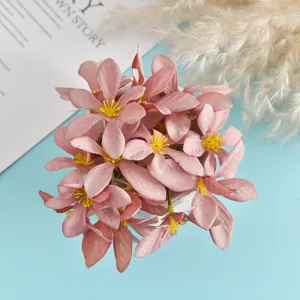 Pink artificial silk flower heads detail view, perfect for DIY crafts and decorative projects.
